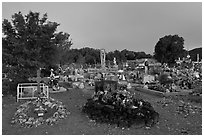 Tomb made of volcanic rocks in cemetery, Rancho de Taos. Taos, New Mexico, USA (black and white)