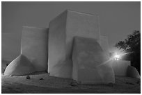 San Francisco de Asisis mission buttresses at night, Rancho de Taos. Taos, New Mexico, USA (black and white)