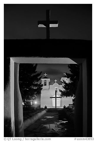 San Francisco de Asisis mission from entrance gate at night, Rancho de Taos. Taos, New Mexico, USA (black and white)