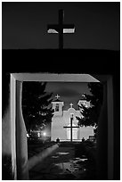 San Francisco de Asisis mission from entrance gate at night, Rancho de Taos. Taos, New Mexico, USA (black and white)