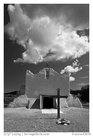 Adobe church and clouds, Picuris Pueblo. New Mexico, USA