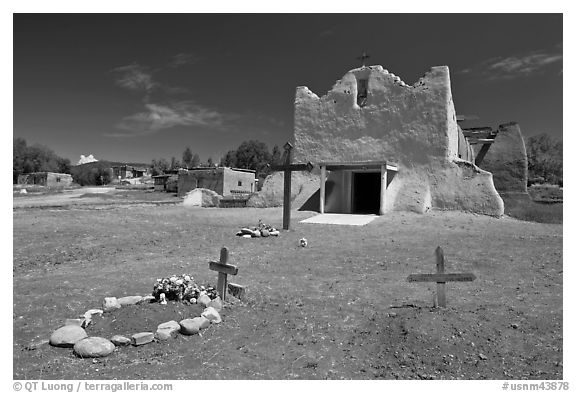 Graves and Picuris Church, Picuris Pueblo. New Mexico, USA