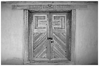 Door of San Jose de Gracia Church. New Mexico, USA (black and white)