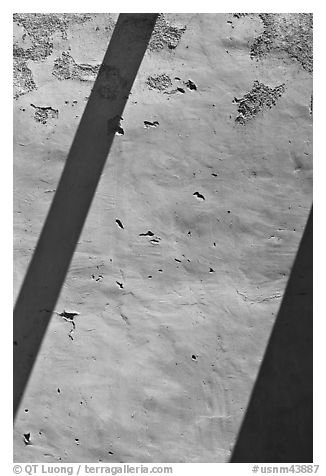 Diagonal shadows on adobe wall, San Jose de Gracia Church. New Mexico, USA