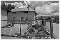 House with blue windows, Truchas. New Mexico, USA ( black and white)