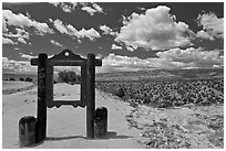 Marker and high desert scenery. New Mexico, USA ( black and white)
