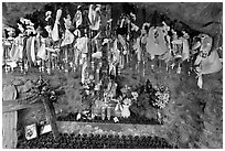 Niche with rosaries, Sanctuario de Chimayo. New Mexico, USA (black and white)