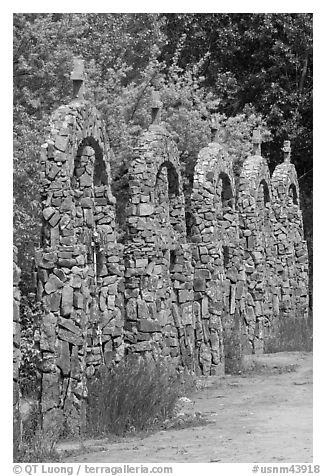 Row of crosses, Sanctuario de Chimayo. New Mexico, USA (black and white)