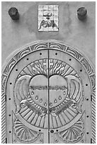 Decorated door, Sanctuario de Chimayo. New Mexico, USA (black and white)