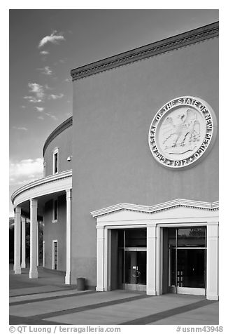 New Mexico Capitol with stone carving of the State Seal of New Mexico above entrance. Santa Fe, New Mexico, USA