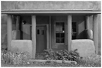 Blue and adobe house porch. Santa Fe, New Mexico, USA (black and white)