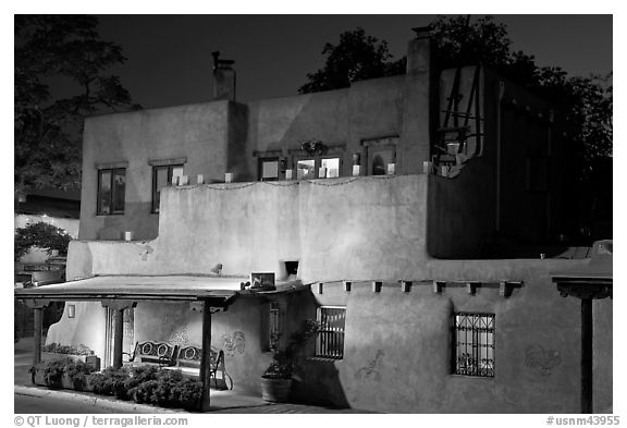 House in Spanish pueblo revival style by night. Santa Fe, New Mexico, USA (black and white)