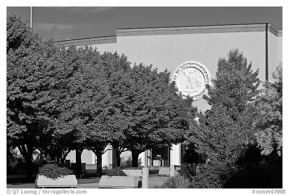 New Mexico State Capitol East entrance and trees. Santa Fe, New Mexico, USA (black and white)