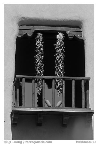 Ristras hanging from tower. Santa Fe, New Mexico, USA (black and white)