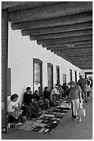 El Palacio Real (oldest public building in the US) with native vendors. Santa Fe, New Mexico, USA (black and white)