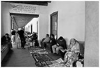 Native americans selling in front of the Palace of the Governors. Santa Fe, New Mexico, USA ( black and white)