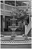 Fountain and white guardrails, old town. Albuquerque, New Mexico, USA (black and white)