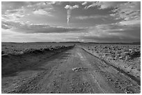 Unpaved road leading to Chaco Canyon. Chaco Culture National Historic Park, New Mexico, USA (black and white)