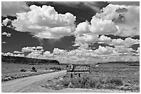 Sign and road at the entrance. Chaco Culture National Historic Park, New Mexico, USA ( black and white)