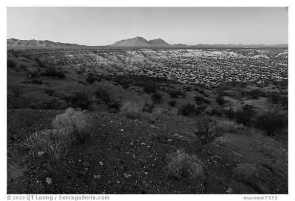 Kilbourne Hole maar volcanic crater, twilight. Organ Mountains Desert Peaks National Monument, New Mexico, USA (black and white)
