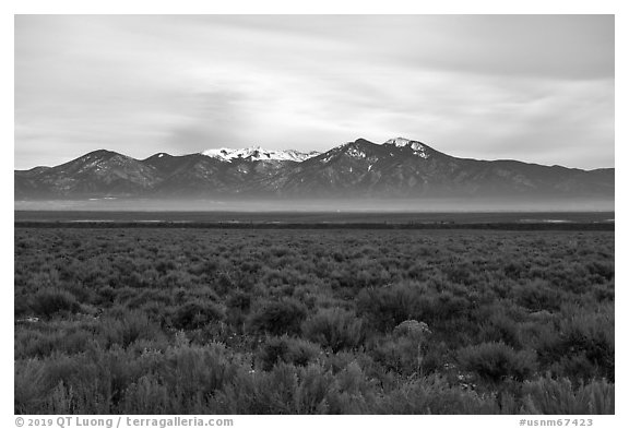 Sagebrush plateau incised by Rio Grande Gorge and Sangre De Cristo Mountains. Rio Grande Del Norte National Monument, New Mexico, USA (black and white)