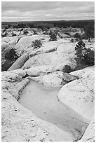 Rainwater pool on bluff. El Morro National Monument, New Mexico, USA ( black and white)