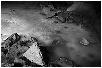 Rocks and ice in collapsed lava tube. El Malpais National Monument, New Mexico, USA ( black and white)