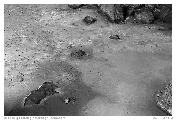 Green ice and rocks, Zuni Ice Cave. El Malpais National Monument, New Mexico, USA (black and white)