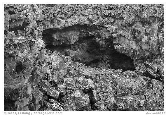 Entrance of lava tube. El Malpais National Monument, New Mexico, USA (black and white)