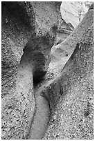 Slot canyon carved in Peralta Tuff. Kasha-Katuwe Tent Rocks National Monument, New Mexico, USA ( black and white)