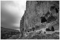 Tuff cliff with cave dwellings, Frijoles Canyon. Bandelier National Monument, New Mexico, USA ( black and white)