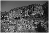 Tyuonyi Pueblo and cliff dwellings by moonlight. Bandelier National Monument, New Mexico, USA ( black and white)