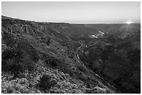 Sun setting over Orilla Verde from Taos Valley Overlook. Rio Grande Del Norte National Monument, New Mexico, USA ( black and white)