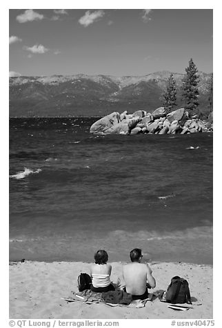 Couple on sandy beach, Lake Tahoe-Nevada State Park, Nevada. USA (black and white)