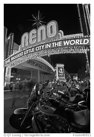 Motorbikes and neon sign at night. Reno, Nevada, USA (black and white)