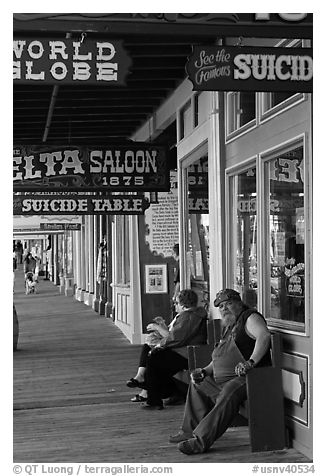 Arcade with suicide table sign. Virginia City, Nevada, USA