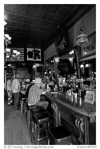 Men inside historic saloon. Virginia City, Nevada, USA