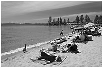 Families on sandy beach, Lake Tahoe-Nevada State Park, Nevada. USA ( black and white)