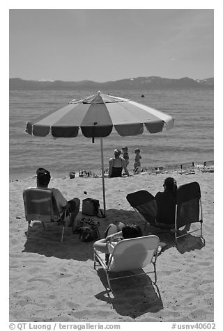 Beach unbrella and family, Sand Harbor, Lake Tahoe-Nevada State Park, Nevada. USA