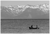 Canoe and snowy mountains, Lake Tahoe, Nevada. USA (black and white)