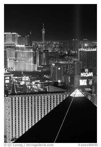 Luxor pyramid, casinos, and Stratosphere tower at night. Las Vegas, Nevada, USA (black and white)