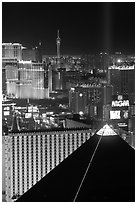 Luxor pyramid, casinos, and Stratosphere tower at night. Las Vegas, Nevada, USA (black and white)