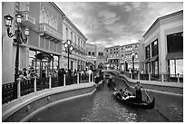 Gondolas and Grand Canal bordered by shops in the Venetian casino. Las Vegas, Nevada, USA ( black and white)