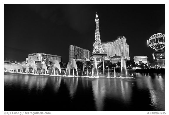 Paris casino and Bellagio fountains by night. Las Vegas, Nevada, USA (black and white)
