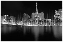 Bellagio dancing fountains and casinos reflected in lake. Las Vegas, Nevada, USA ( black and white)