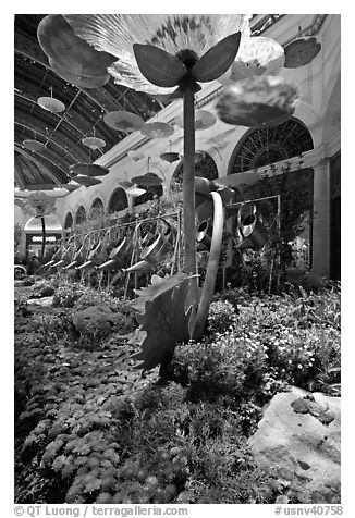 Giant watering cans in indoor garden, Bellagio Hotel. Las Vegas, Nevada, USA