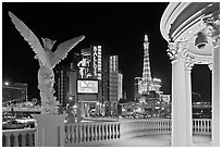 Gazebo and statue of Caesar Palace frames Ballys and Paris Hotel. Las Vegas, Nevada, USA (black and white)