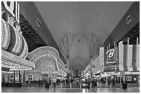 Pedestrian, canopy-covered section of Fremont Street. Las Vegas, Nevada, USA ( black and white)