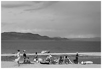 Lakeshore beach recreation, approaching storm. Pyramid Lake, Nevada, USA (black and white)