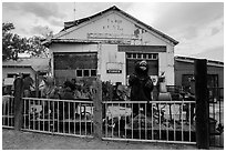 Wood sculptures and weathered building, Gerlach. Nevada, USA (black and white)